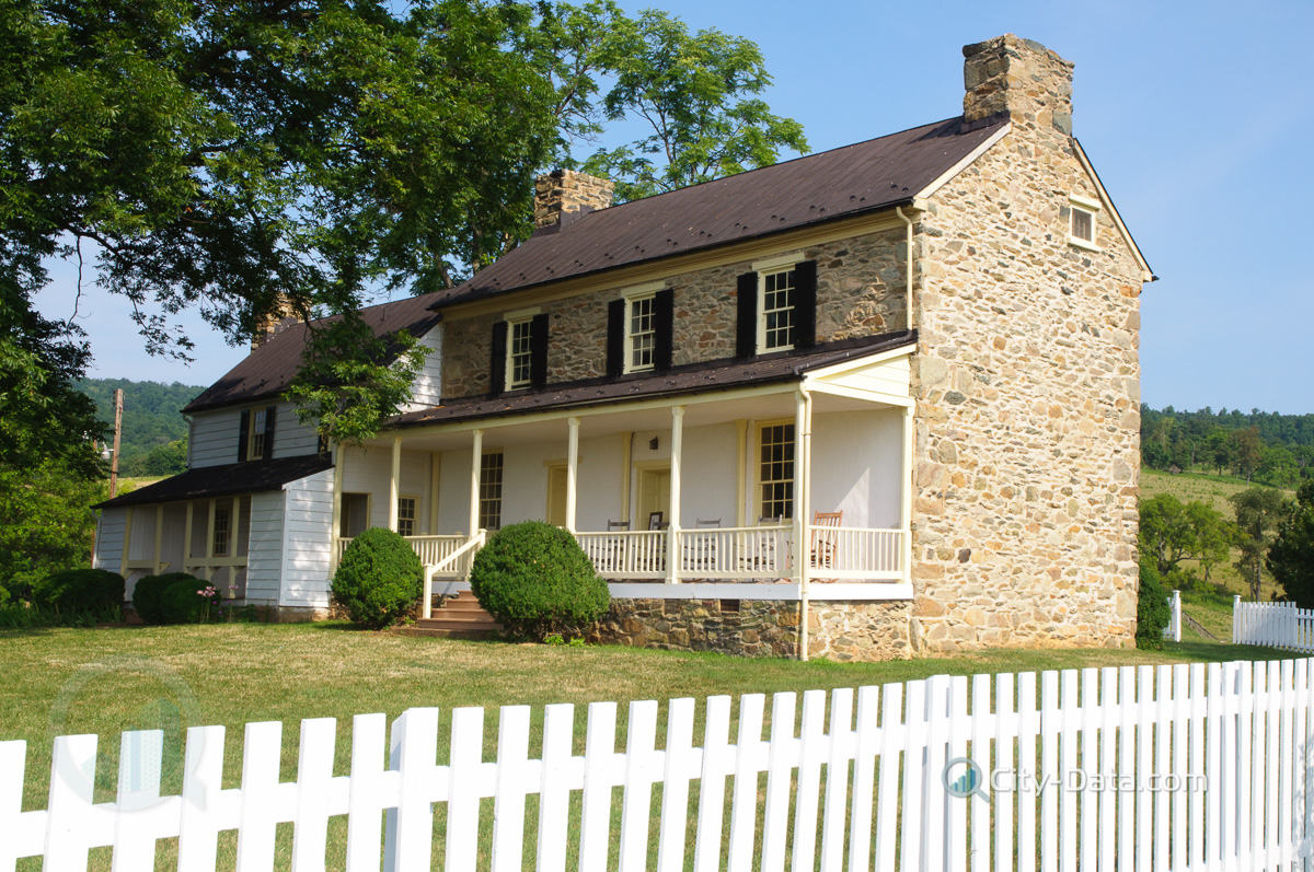 American house and white pickett fence