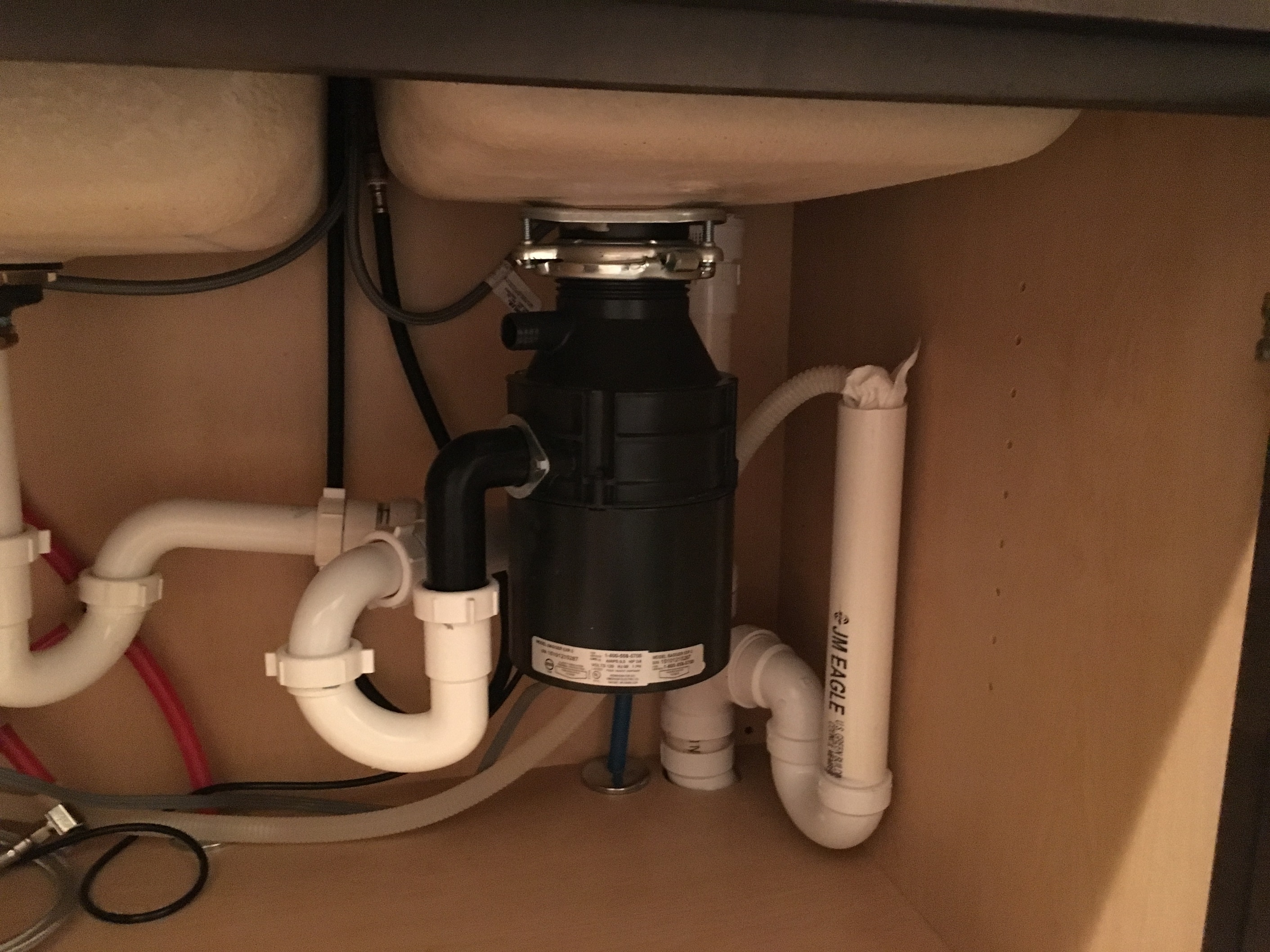 sewer gas smell under kitchen sink